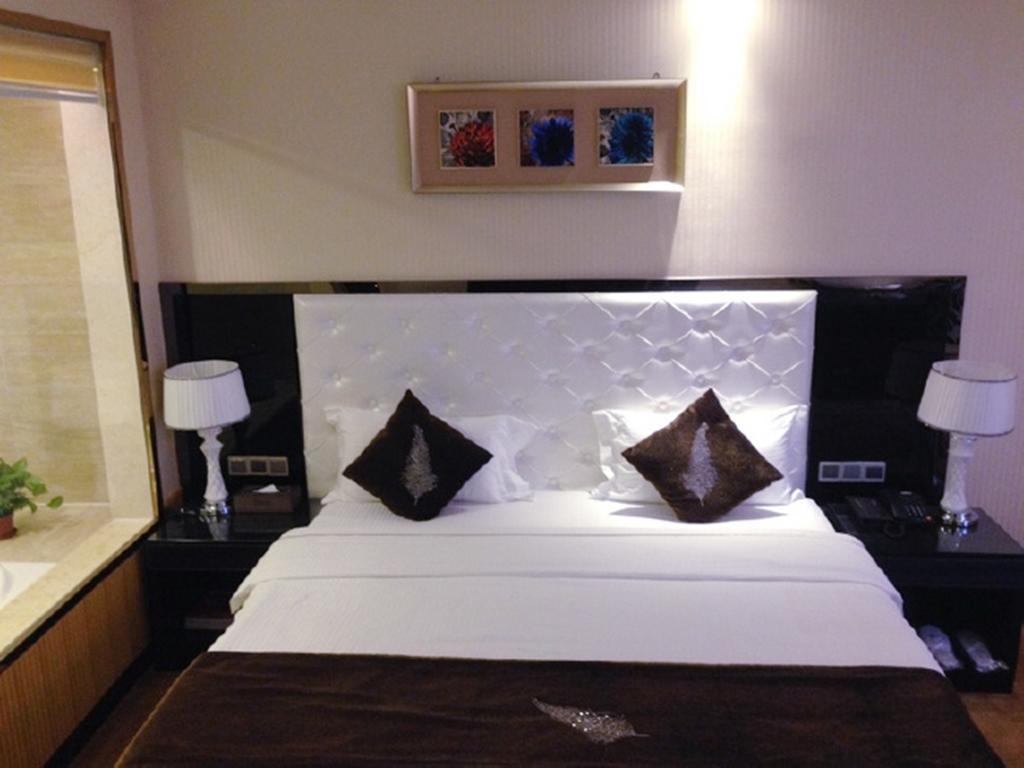 Tianguo Times Hotel Foshan Camera foto
